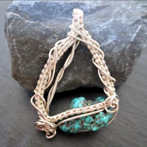 Turquoise ornate pendant